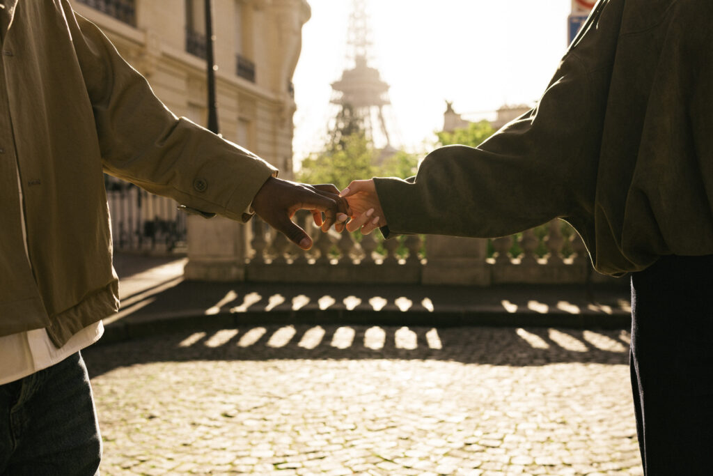 close up shot couple holding hands